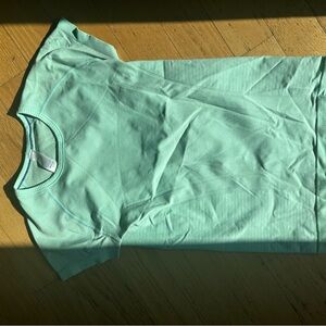 Ivivva swiftly tech top. Teal size 14